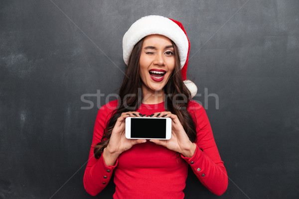 Szczęśliwy brunetka kobieta czerwony bluzka christmas Zdjęcia stock © deandrobot