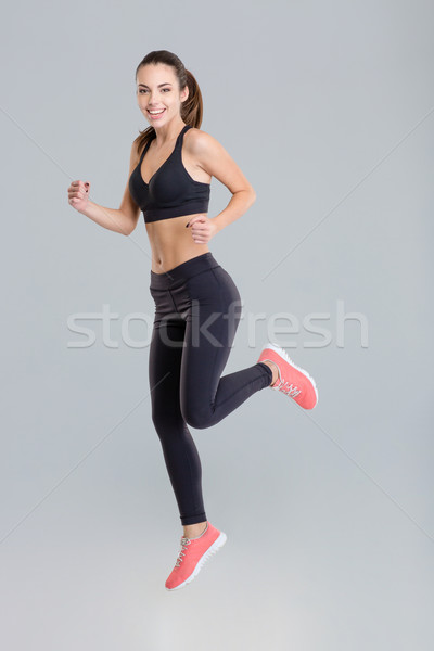 Alegre ativo jovem fitness desgaste Foto stock © deandrobot