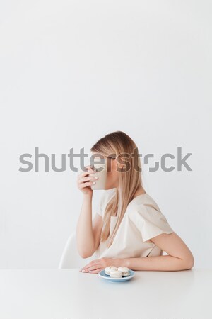 Sensual woman in necklace made of blades licking vintage razor Stock photo © deandrobot