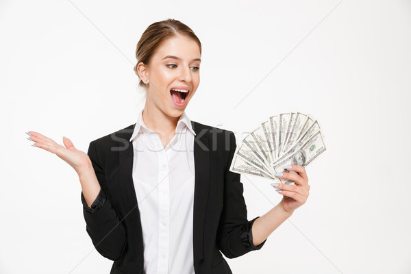 Feliz gritando mulher de negócios dinheiro Foto stock © deandrobot