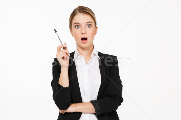 Shocked blonde business woman having idea and looking at camera Stock photo © deandrobot