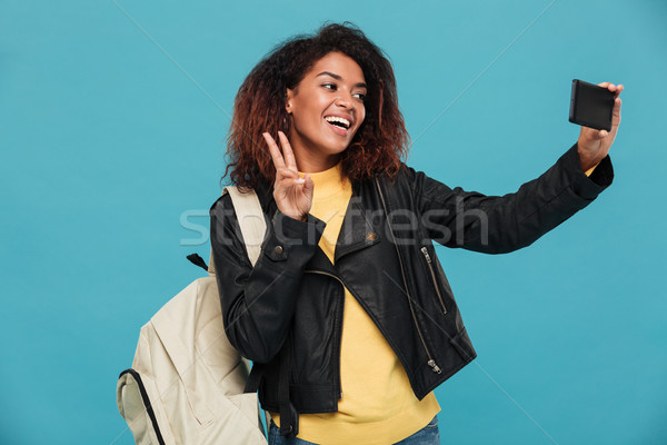 Feliz África mujer chaqueta de cuero mochila Foto stock © deandrobot