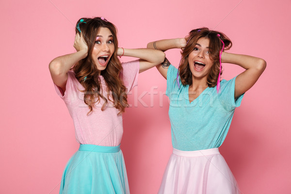 Retrato dois alegre meninas colorido roupa Foto stock © deandrobot