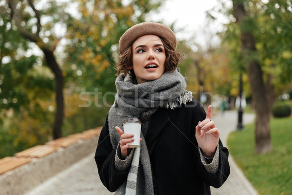 Portrait of a pretty girl dressed in autumn clothes Stock photo © deandrobot