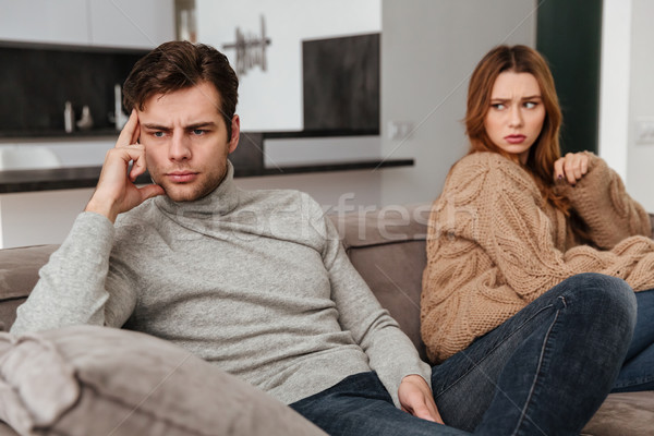 Sad displeased loving coupe don't talking with each other Stock photo © deandrobot