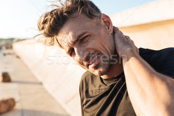 Portret sportowiec cierpienie ból szyi stałego odkryty Zdjęcia stock © deandrobot