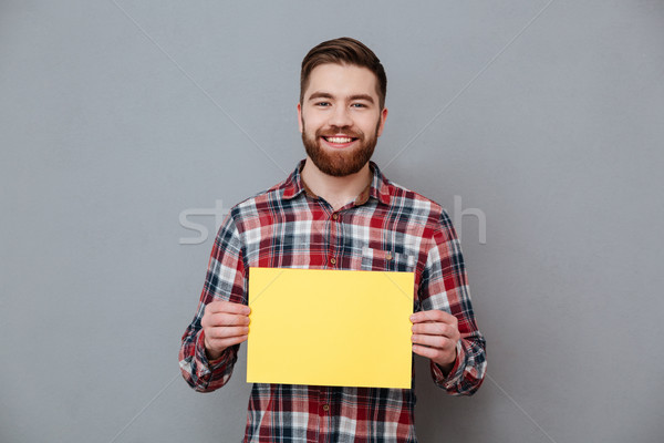 Feliz jóvenes barbado hombre espacio de la copia Foto stock © deandrobot