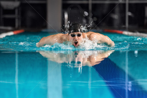 Maschio nuotatore nuoto farfalla giovani sport Foto d'archivio © deandrobot