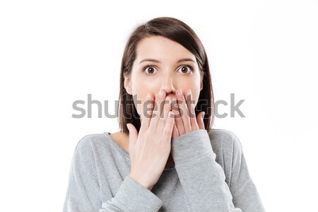 Portré meglepődött lány befogja száját kéz közelkép Stock fotó © deandrobot