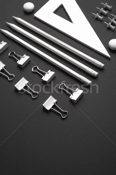 Office supplies on the black background table Stock photo © deandrobot
