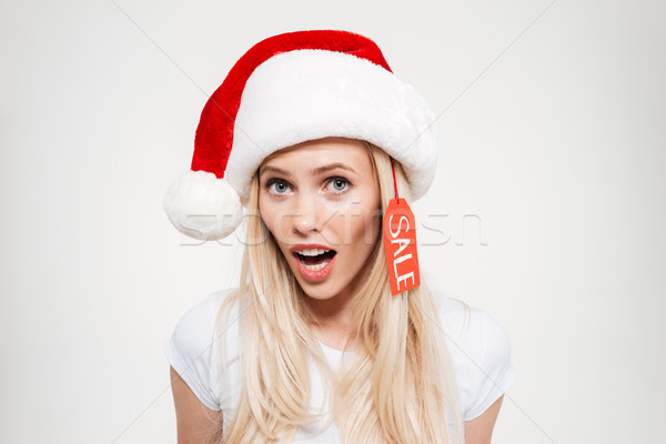 Close up portrait of a pretty excited blonde woman Stock photo © deandrobot