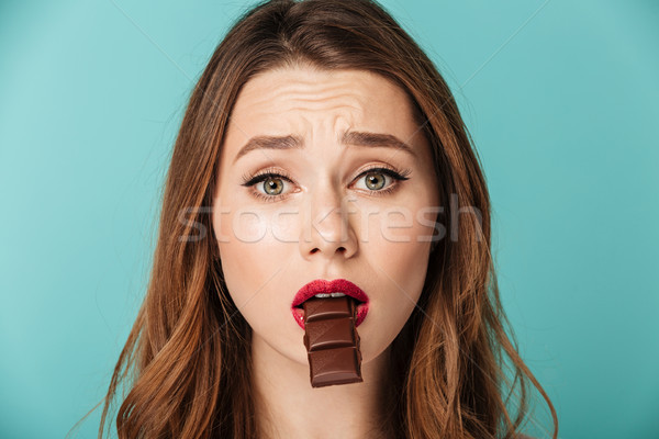 Portrait of a sad brown haired woman Stock photo © deandrobot