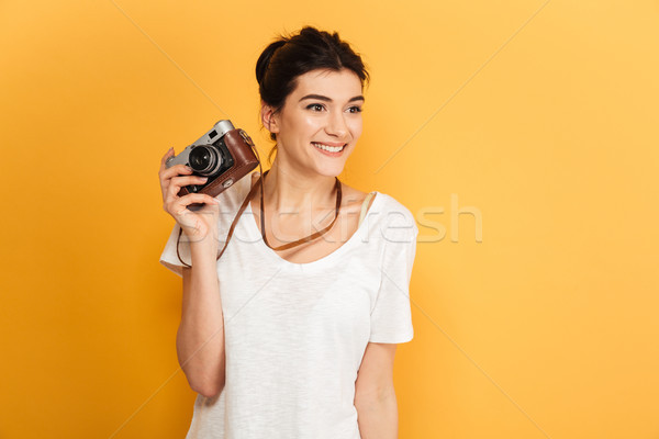 Emotional happy young pretty woman photographer Stock photo © deandrobot