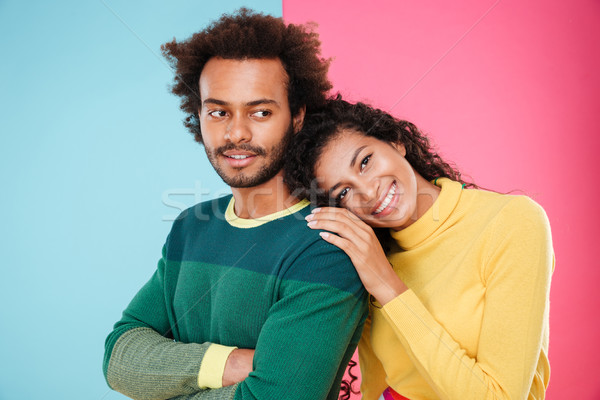 Portrait of happy tender african american young couple Stock photo © deandrobot