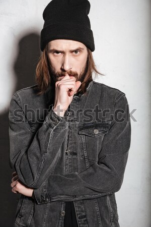 Vertical image of hipster in snap back Stock photo © deandrobot