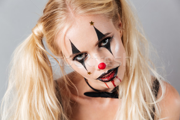 Close-up portrait of mystery blonde woman in halloween make up Stock photo © deandrobot