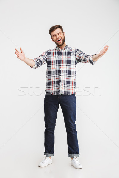 Portret opgewonden jonge man vieren succes Stockfoto © deandrobot