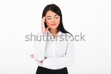 Businesswoman making silence sign  Stock photo © deandrobot