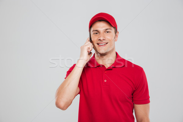 ?ourier talking on the phone Stock photo © deandrobot
