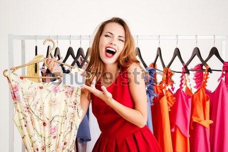 [[stock_photo]]: Jeune · femme · deux · robes · photos · permanent