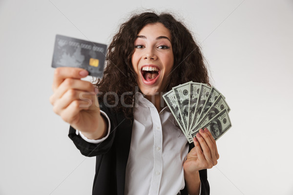 Excitado feliz jóvenes mujer de negocios tarjeta de crédito dinero Foto stock © deandrobot