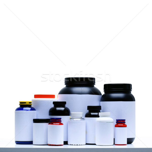 Sport Nutrition Supplement containers isolated on white Stock photo © deandrobot