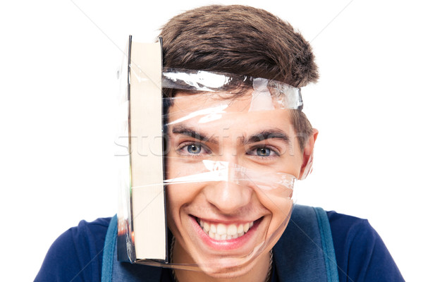 Male student with book strapped to his head Stock photo © deandrobot