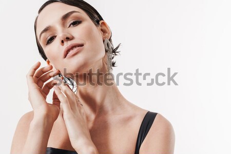 Closeup portrait of attractive female model Stock photo © deandrobot
