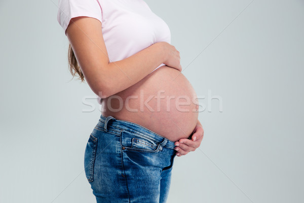 Closeup portrait of a pregnant woman Stock photo © deandrobot
