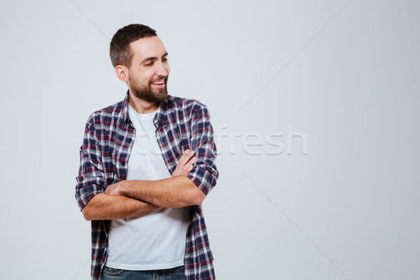 Smiling Bearded man in shirt with crossed arms Stock photo © deandrobot