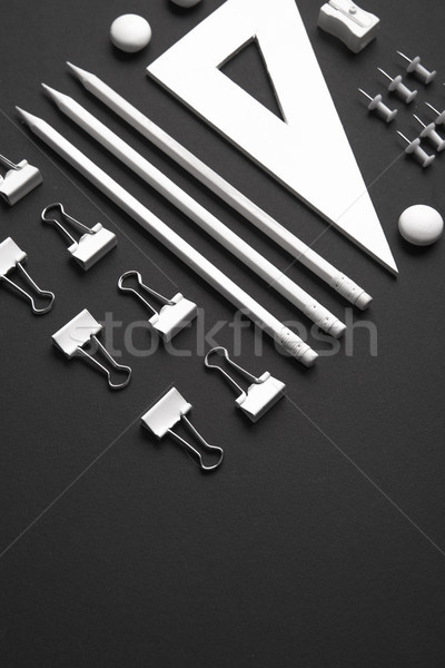 Office supplies on the black background table Stock photo © deandrobot