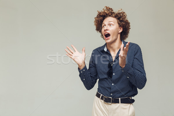 Shocked retro man screaming. Stock photo © deandrobot