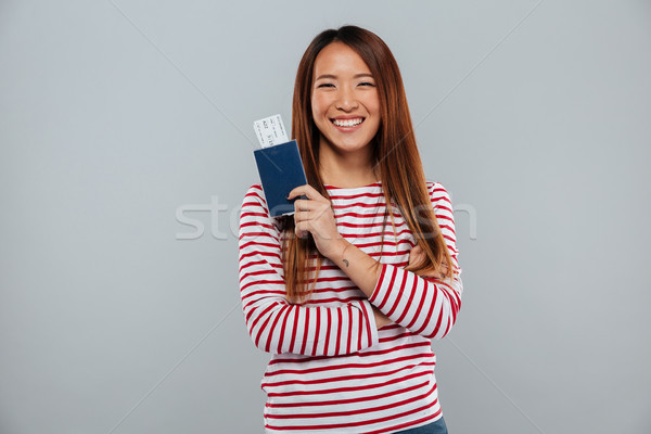 Stockfoto: Gelukkig · asian · vrouw · trui · paspoort