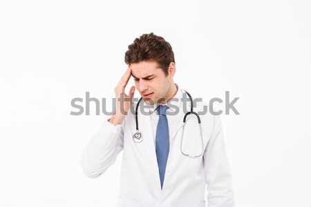Portrait of a young male doctor with stethoscope Stock photo © deandrobot