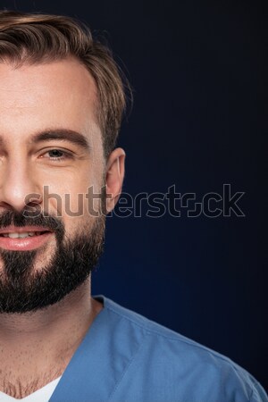 Pierde in sus portret zâmbitor medic de sex masculin Imagine de stoc © deandrobot