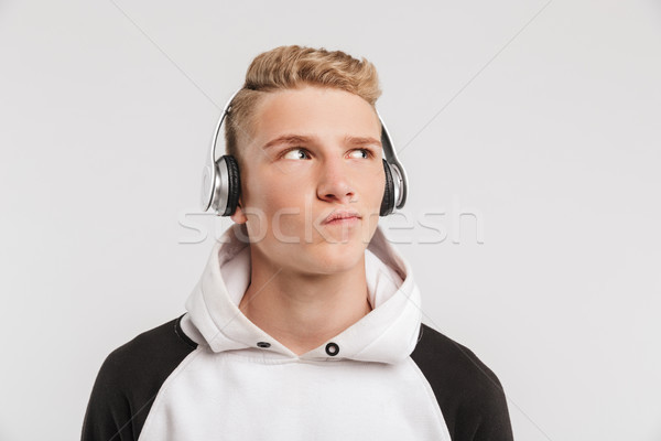 Portrait closeup of stylish teenager old thinking and looking as Stock photo © deandrobot