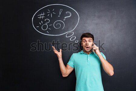 Stock photo: Young woman covering her ears 