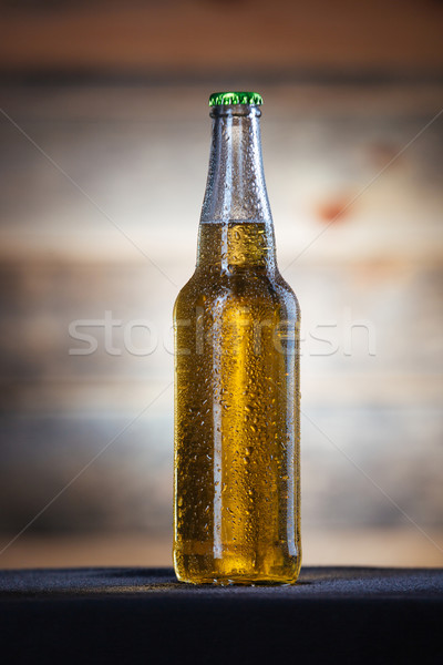 Bottle with beer Stock photo © deandrobot