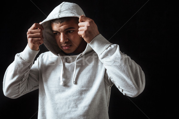 Sad frustrated african american young man wearing hoodie Stock photo © deandrobot