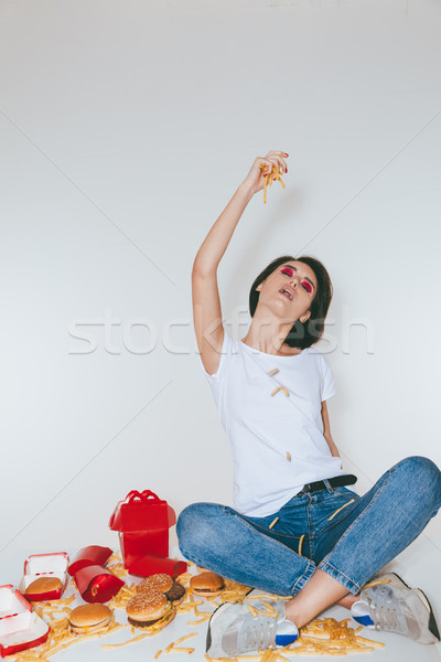 Foto stock: Bastante · mulher · jovem · alimentação · branco