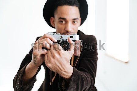 Afryki człowiek Fotografia retro kamery Zdjęcia stock © deandrobot
