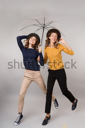 Full-length image of mad woman in dress ready to attack Stock photo © deandrobot