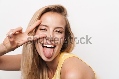Portrait of a pretty brown haired woman Stock photo © deandrobot