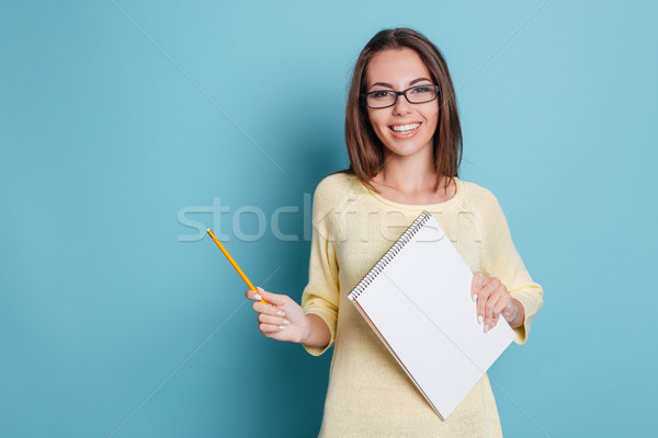 Riendo alegre bastante nina cuaderno Foto stock © deandrobot