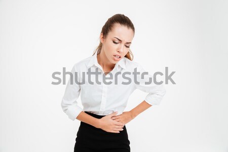 Retrato jóvenes mujer de negocios estómago dolor blanco Foto stock © deandrobot