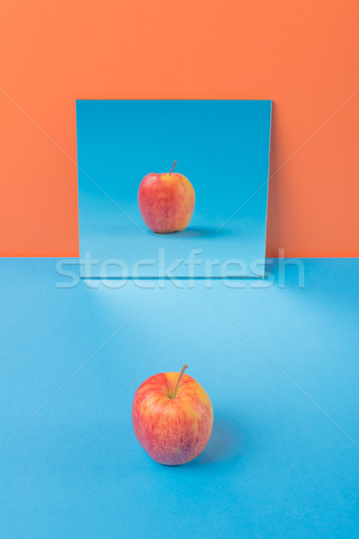 Apfel blau Tabelle isoliert orange Bild Stock foto © deandrobot