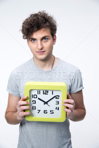 Gut aussehend männlich Studenten groß Uhr grau Stock foto © deandrobot