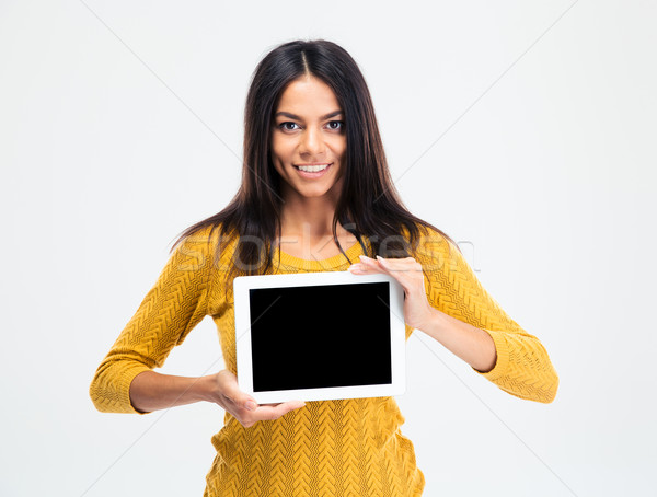 Woman showing blank tablet computer screen  Stock photo © deandrobot