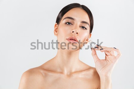 Assustado mulher jovem olhando beleza injeção seringa Foto stock © deandrobot