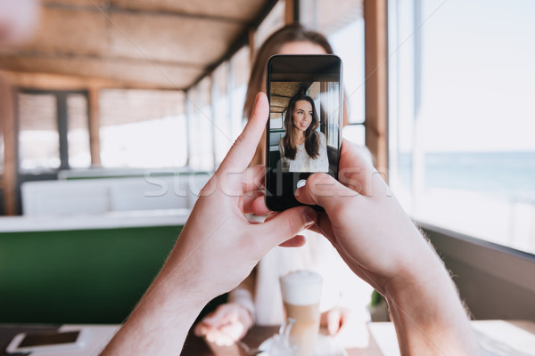 First-person view of man making photo his woman Stock photo © deandrobot